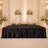 Elegant wedding reception backdrop with white roses, candles, and black velvet tablecloth
