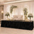 Elegant wedding stage with cream sofa, white florals, gold frames, and candles
