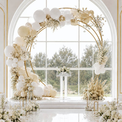 Elegant white and gold balloon floral wedding backdrop by large window