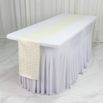 Elegant white table with lavender drape and cream runner on marble floor