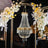 Elegant crystal chandelier adorned with flowers, showcasing a luxurious design.