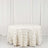 Elegant ivory rose-patterned tablecloth on a round table.