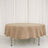 Round beige tablecloth on a table with a plain background.