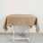 Brown linen tablecloth draped on a white folding table.
