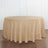 Round beige tablecloth draping over a circular table
