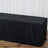 Black table cover draped over a rectangular table in a studio setting.