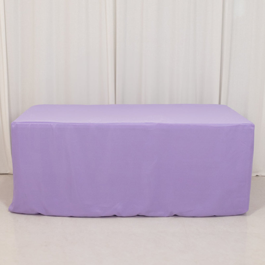 Purple table cover on a plain backdrop.