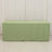 Green table cover for a rectangular table, studio shot.