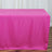 Pink table cover on a wooden floor.