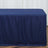 Navy tablecloth draped over a table in a studio setting