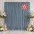 Flame retardant blue satin backdrop with white floral wedding decor and candles