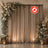 Flame retardant wedding backdrop with floral arch and draped curtains