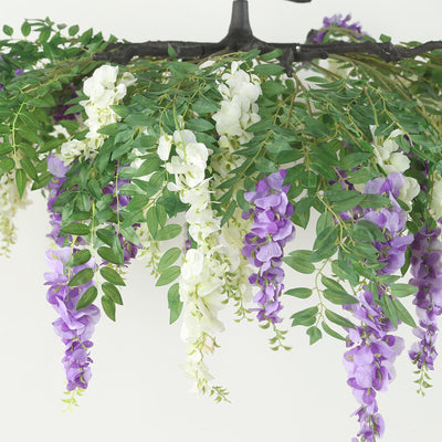 Artificial wisteria flowers in purple and white, perfect for home decor.