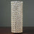 Elegant crystal table lamp with a shimmering design.