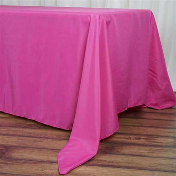 Add Elegance to Your Event with a Fuchsia Seamless Polyester Rectangle Tablecloth