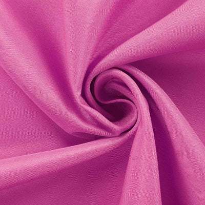 Bright pink fabric swirl showcasing texture and color.