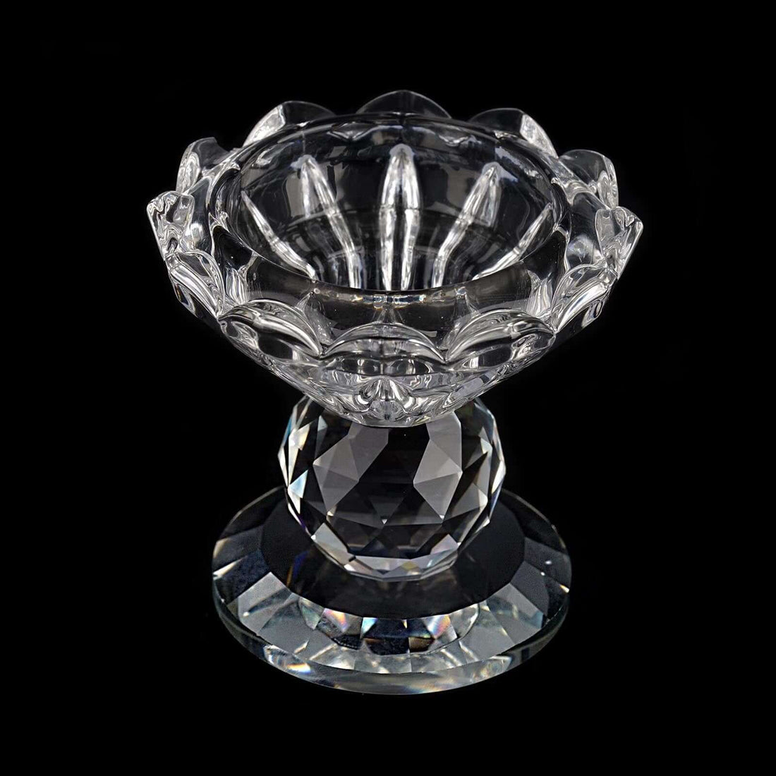 Crystal decorative bowl with intricate design and faceted base.
