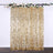 Gold sequin curtain with floral top decoration for events and parties.