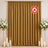 Gold flame-retardant curtain backdrop with white floral and candle decor