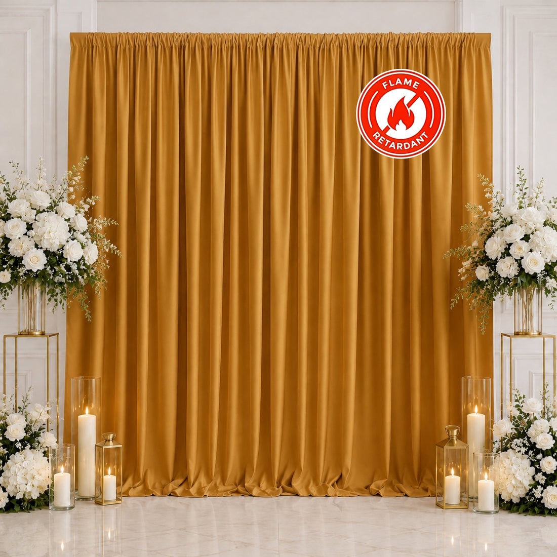 Gold flame retardant wedding curtain backdrop with white floral arrangements and candles