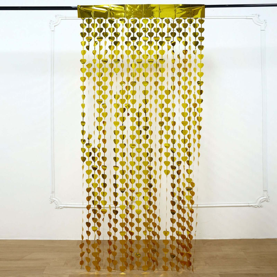Gold heart curtain hanging in a room