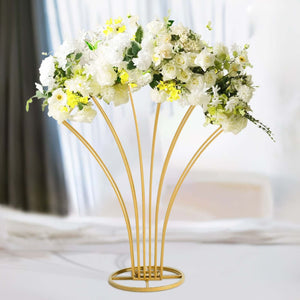 Elegant gold flower vase with white floral arrangement