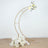 Gold crescent moon floral arch with white roses and greenery