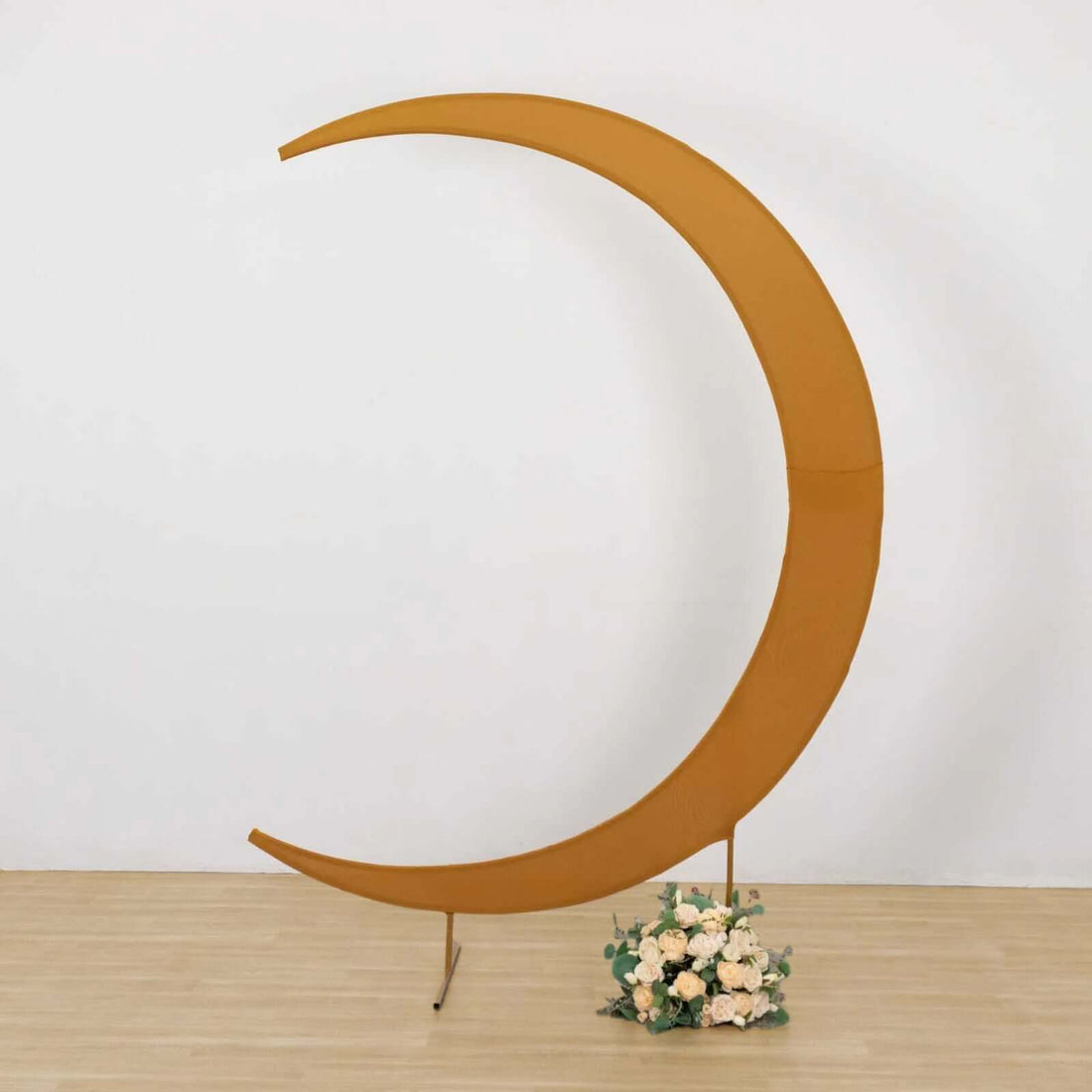 Decorative crescent moon backdrop with floral arrangement