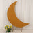 Crescent moon backdrop in warm tones with floral arrangement