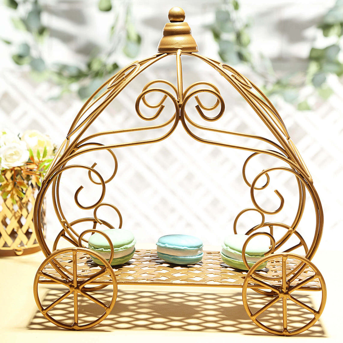 Gold decorative carriage stand with macaron display.