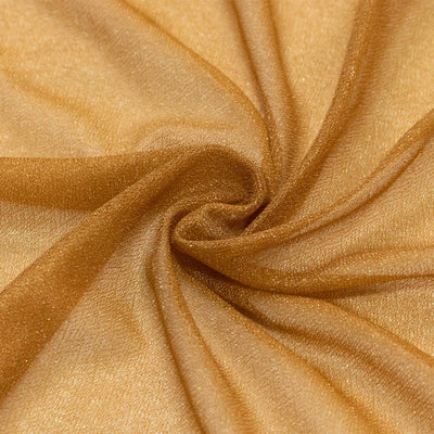Golden satin fabric texture with elegant swirl folds#whtbkgd