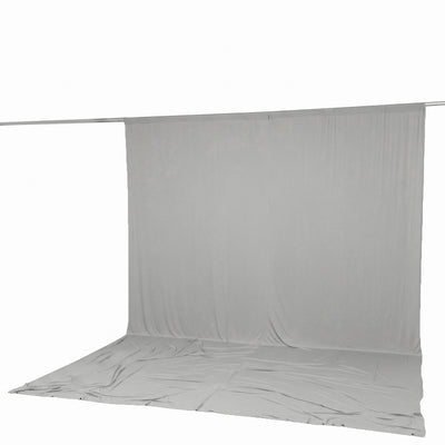 Gray fabric backdrop and floor drape on a metal rod, studio photography setup