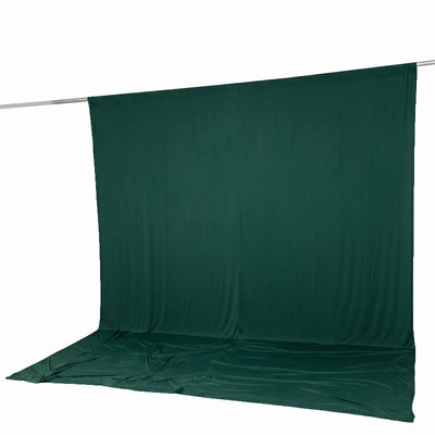 Green fabric backdrop on support pole, studio photography background panel