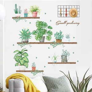 Decorative wall art featuring plants and gardening accessories in a modern setting.
