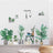 Indoor plant wall art featuring various green plants and decorative elements.