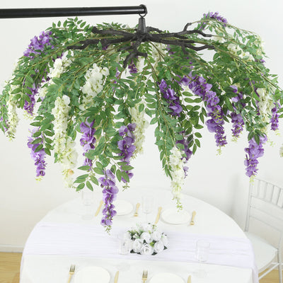 Purple and white wisteria chandelier centerpiece for event decor.