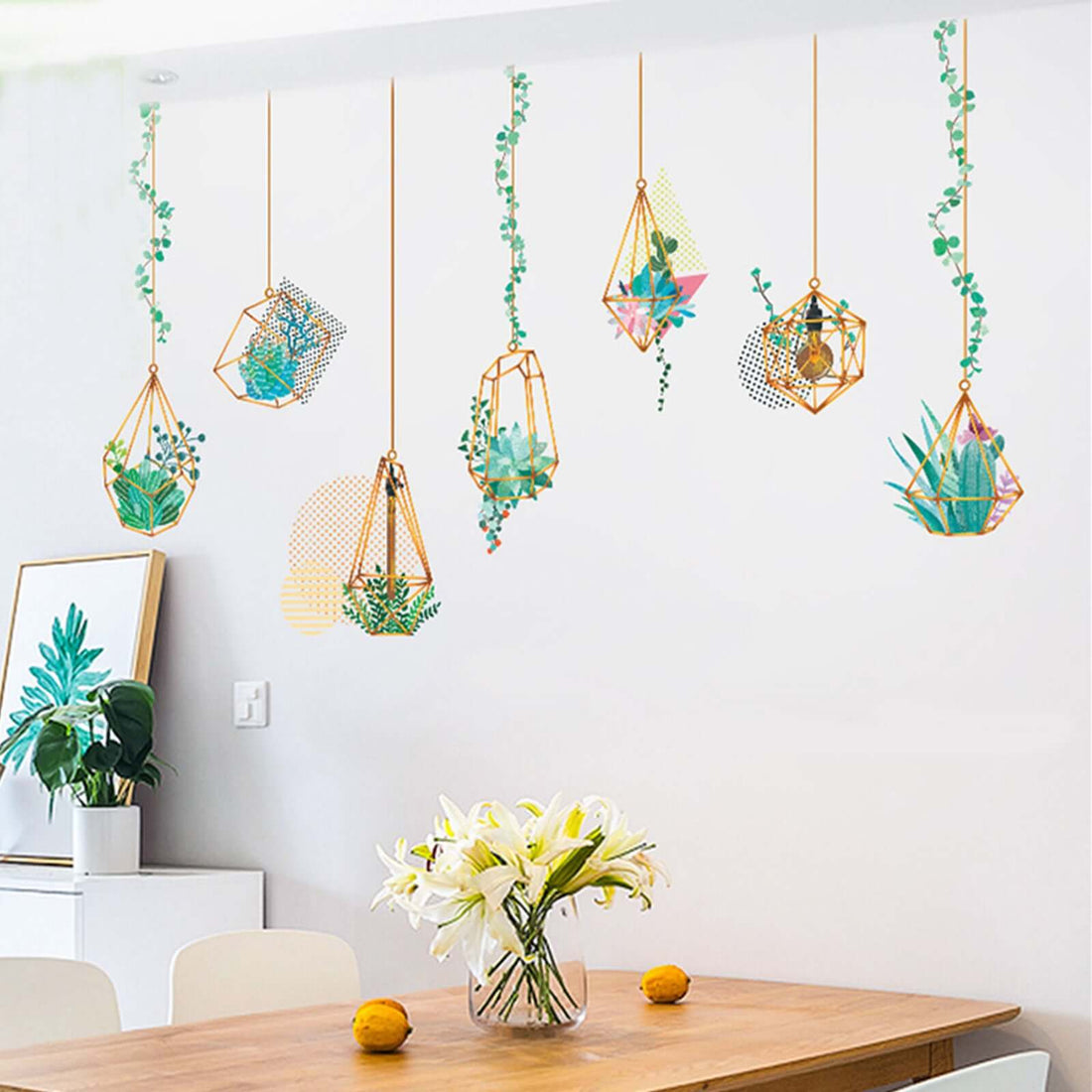 Hanging geometric planters with succulents in a modern kitchen setting.