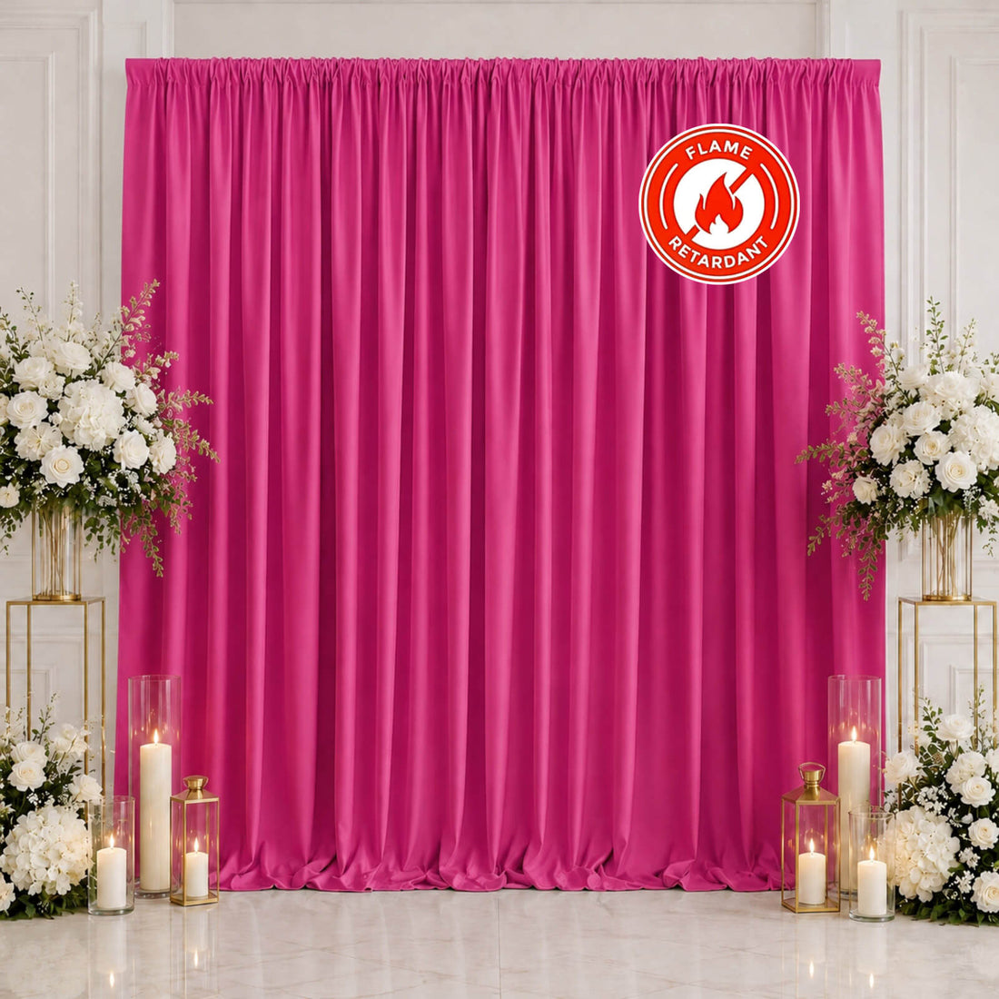 Hot pink flame-retardant curtain backdrop with white floral wedding decor and candles
