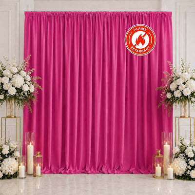 Hot pink flame-retardant curtain backdrop with white floral wedding decor and candles