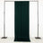 Dark green fabric draped on a black stand in a studio setting