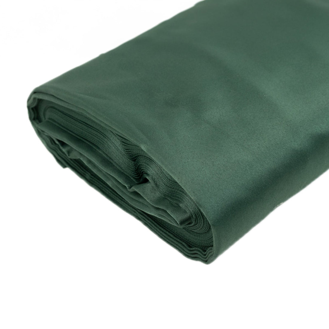 Green satin fabric roll on a plain background
