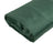 Green satin fabric roll on a plain background