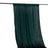 Dark green textured curtain hanging from a rod