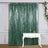 Green sequin backdrop curtain with vintage white table and decor.