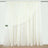 Sheer white curtain draping elegantly on a rod.