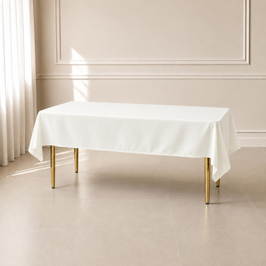 Ivory linen texture tablecloth 54"x96" on a table in a bright setting.