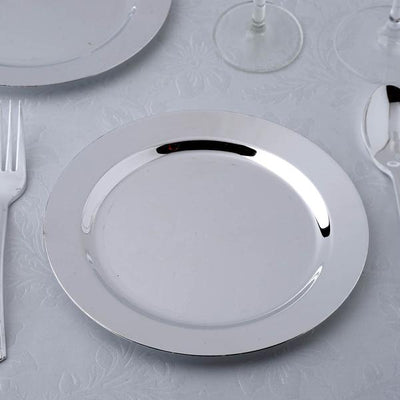 Elegant silver charger plate on a textured table setting.