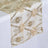 Embroidered table runner with floral design in gold and cream tones. #whtbkgd