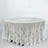 Round lace tablecloth with intricate floral design on a white background.