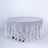 White round lace tablecloth draped over table